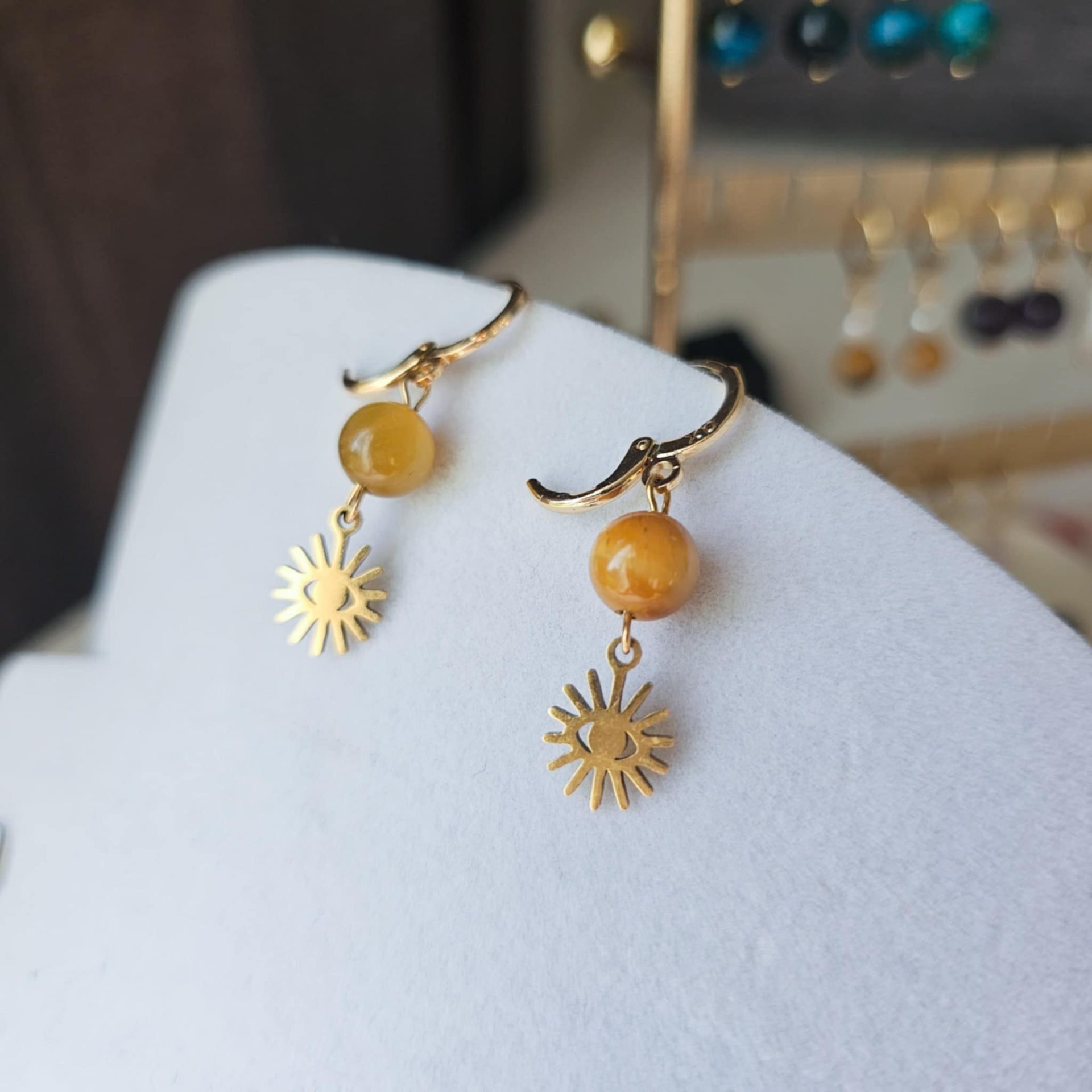 Boucles d'oreilles soleil et oeil de chat